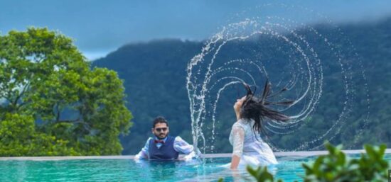 Explore Magical Honeymoon Photography Sessions in Munnar with Shola Crown in a pool